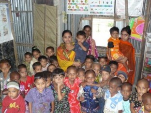 Anchal mother Farida Yasmin with her students Anchal mother with her students at a creche in Manohardi, Bangladesh