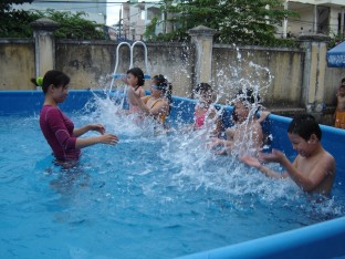 Kids becoming familiar with the water in Danang